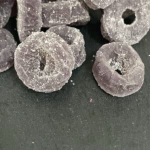 Aniseed Rings on a black background