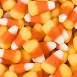pile of Zachary Candy Corn - small candy pyramids of yellow, orange and white layers