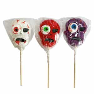 three skull shaped lollipops with a marshmallow eye